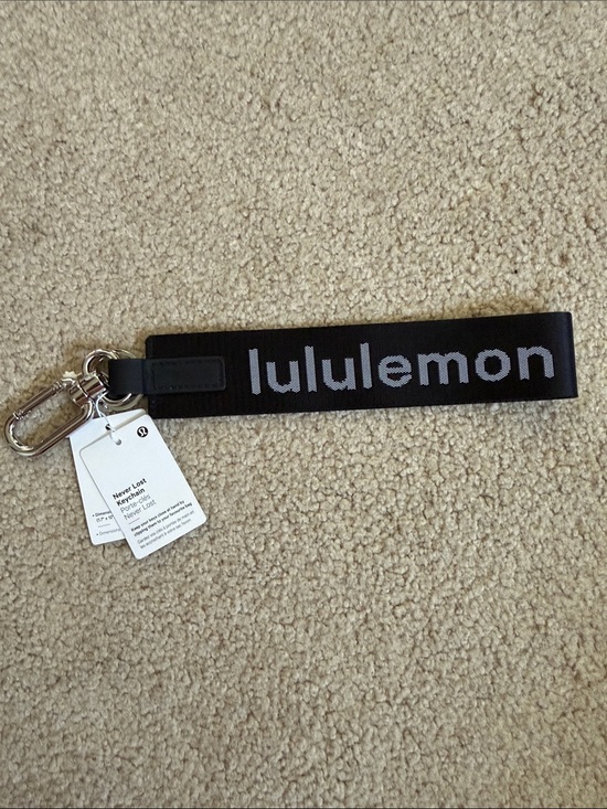lululemon athletica Other - NWT Lululemon athletica Black Keychain Wristlet with Gray Logo Never Lost